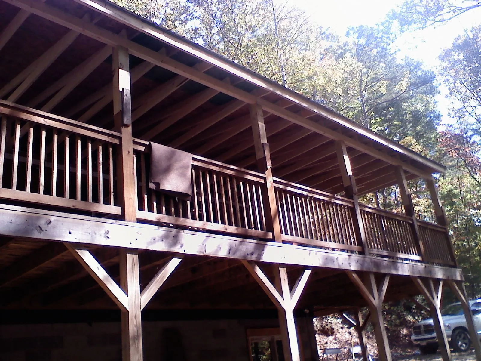 Timber framing under a new elevated porch and deck — Roof Leak Repair in Redford by Roofing Brothers